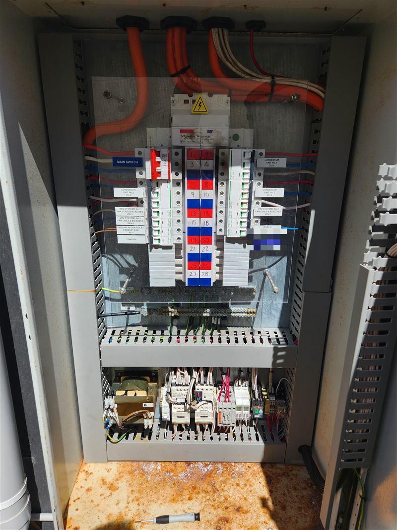 A labelled mechanical switchboard controlling condensers and VRV fan coils